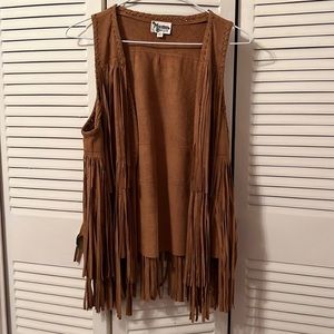 Tan fringe vest. Super cute over a dress or wear casual with jeans.